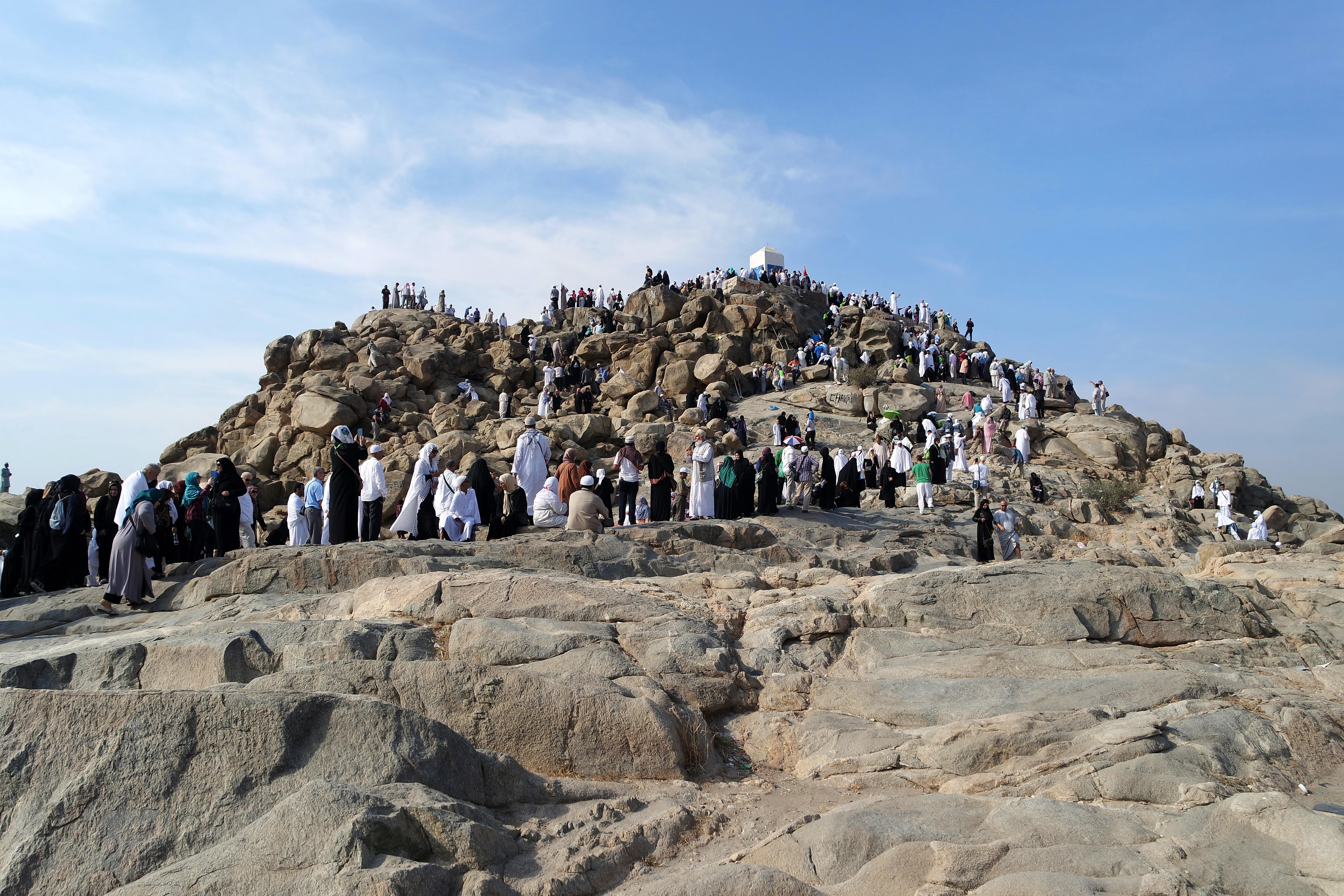Pilgrims standing at Mount Arafat on the outskirts of Mecca.