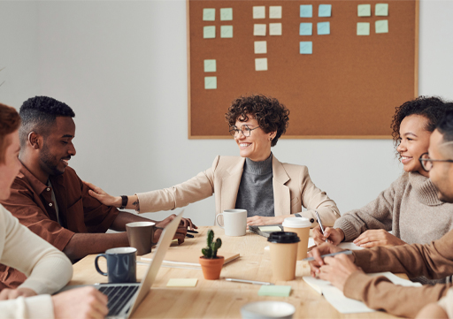 A group of people around a table.