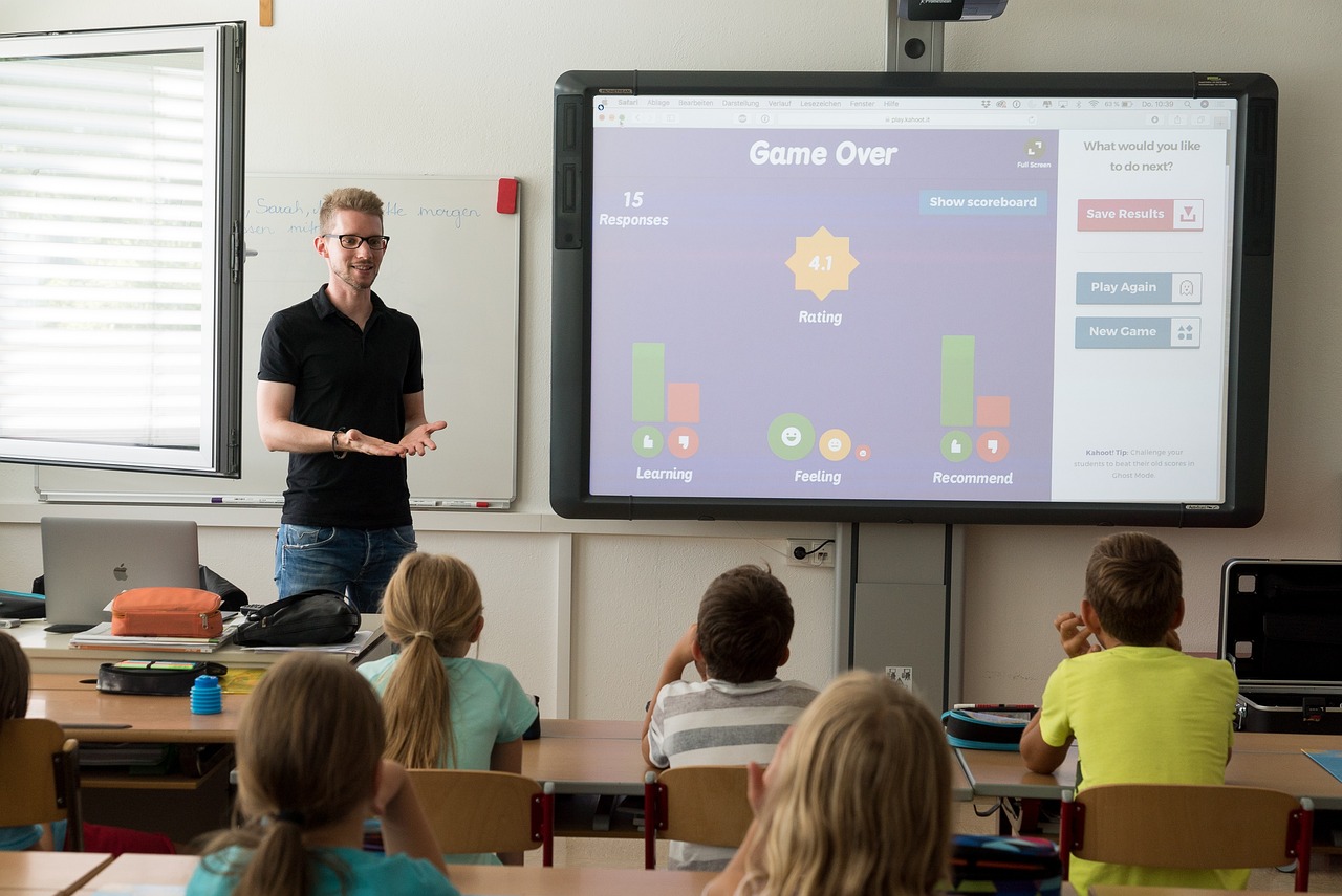 Teacher with a interactive board