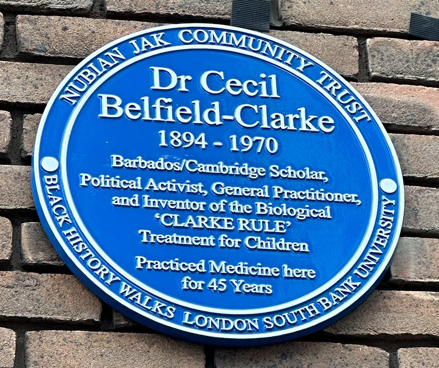 Nubian Jak and Black History Walks Blue Plaque Commemorating Dr Cecil Belfield-Clarke 