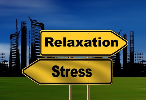Two signs labelled ‘Relaxation’ and ‘Stress’ pointing in different directions.