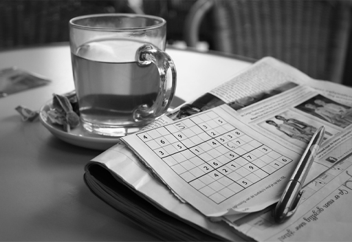 A hot drink and a puzzle.