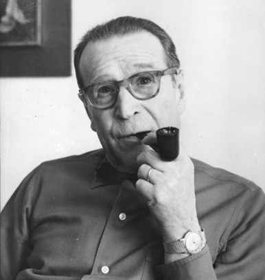 A black and white image of Georges Simenon.