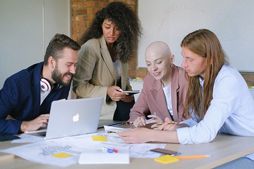 A group of people around a table.