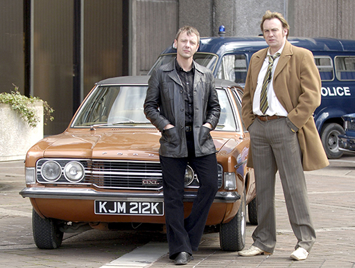 A photograph of Gene Hunt and Sam Tyler from the television programme Life on Mars.