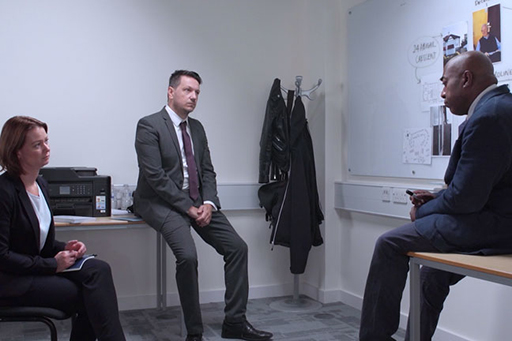 A photograph of SIO Harris, DS Sund and DI Bullet.