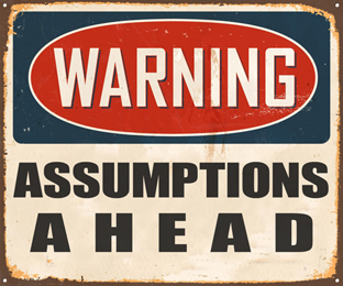 Sign with the words 'Warning assumptions ahead'.