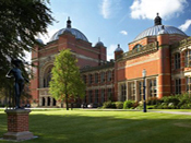 Photograph of a large domed brick building on University of Birmingham campus.