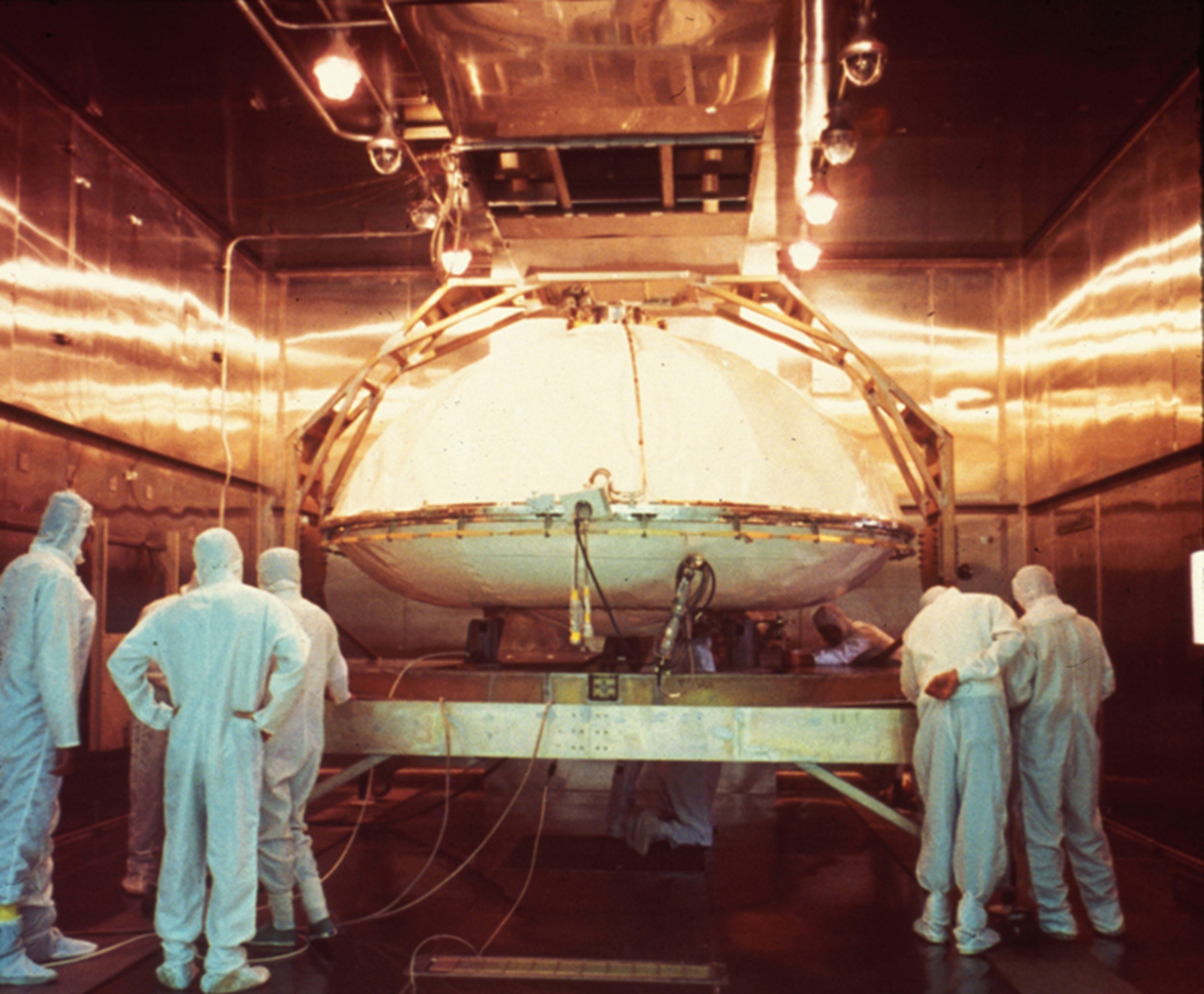 A Viking lander and scientists in a cleanroom