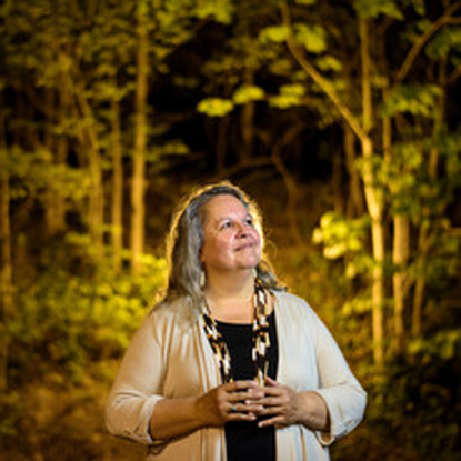 A photograph of Robin Wall Kimmerer.