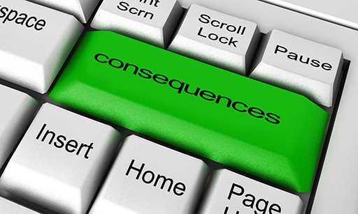 Computer keyboard with a green button labelled ‘Consequences’.