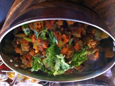 What impact are tighter immigration restrictions having on the UK's curry houses?