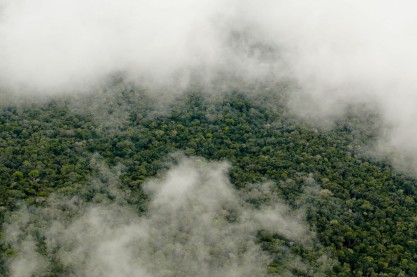 How are tiny air pollutants causing massive storms in the Amazon?