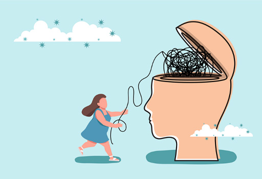 A person pulling on a ball of string which is inside a model of a head.