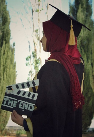 A person wearing graduation clothing.