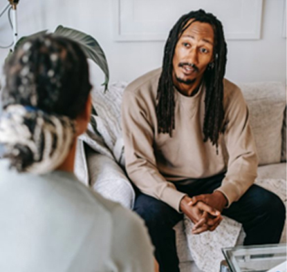 Two people in conversation.