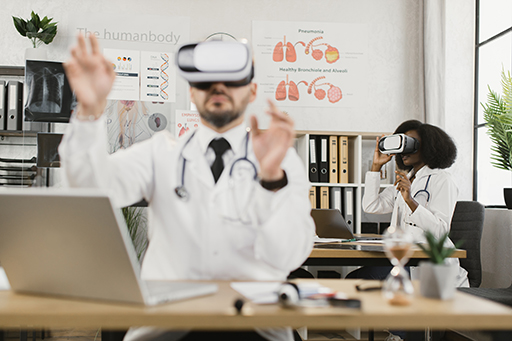 Photograph of healthcare practice education students engaging in/with forms of digital simulation.