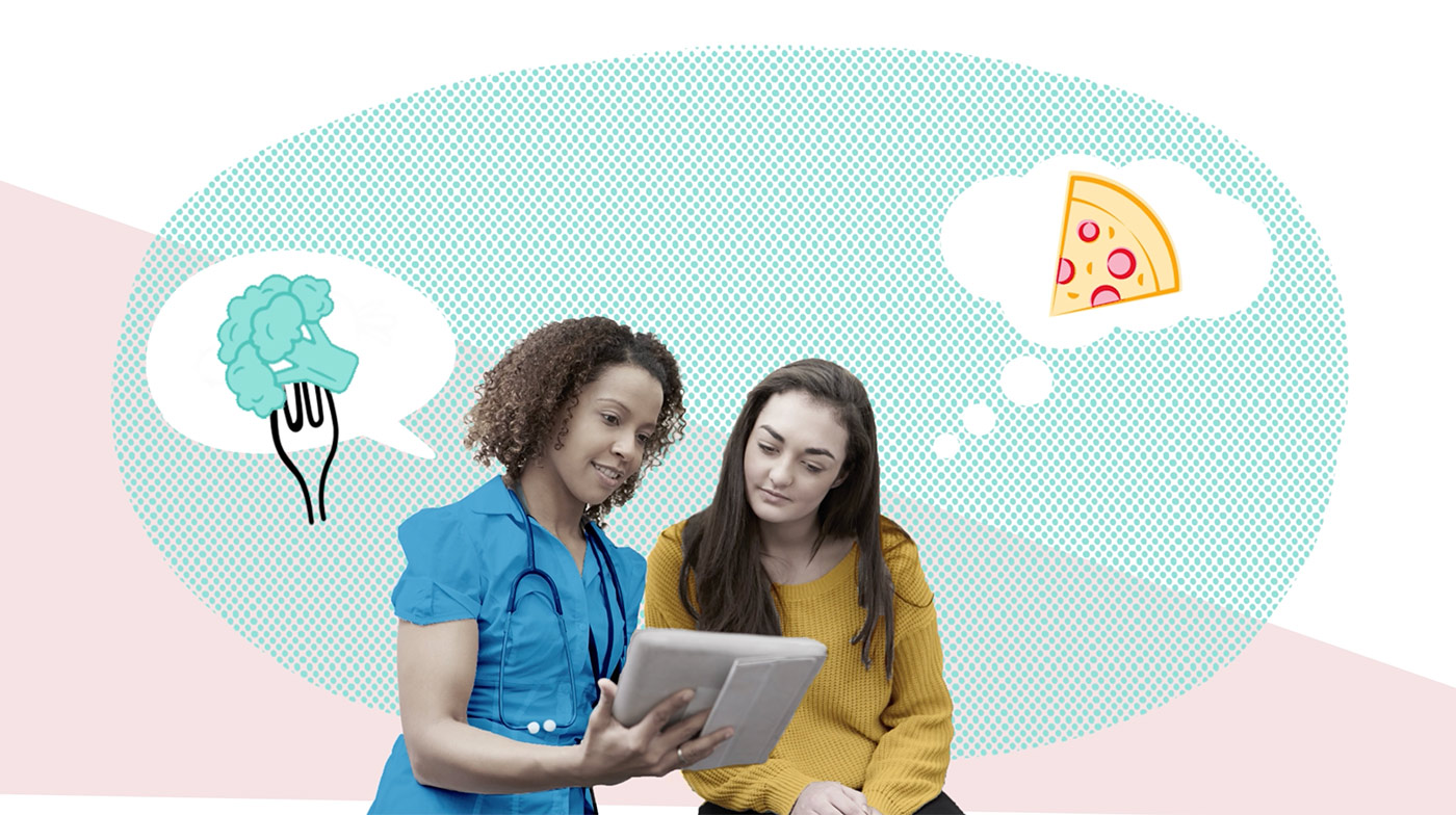 The family are dining together at a table