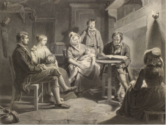A black and white photo from the Georgian or Victorian period showing three males and three females sitting around a small table. One of the females is holding a child who is laying on their lap. 