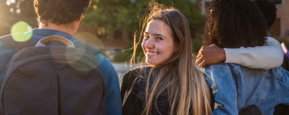 Group of students, one smiling