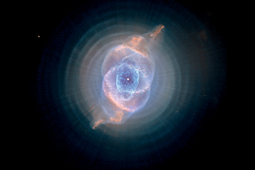 An image shows the Cat's Eye planetary nebula.