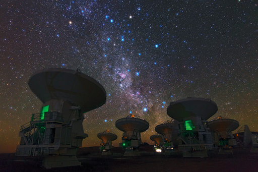 An image shows a number of large telescopes.