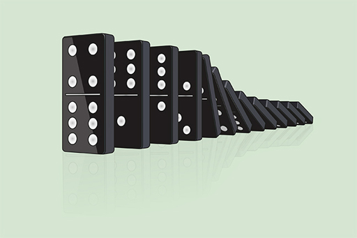 The image is of a row of dominoes falling from right to left.