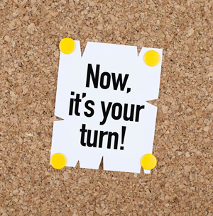 Note pinned to cork board reads: Now it’s your turn!