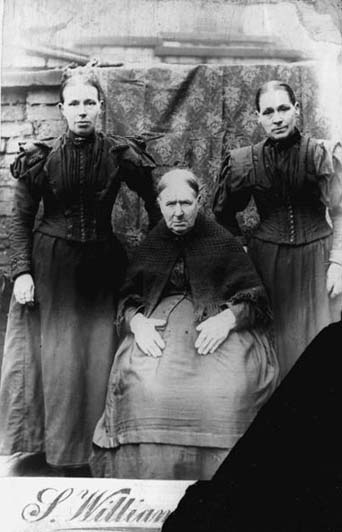 A photograph of three women