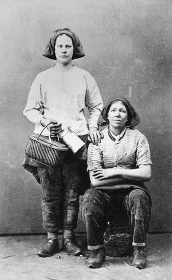 A photograph of two pit brow lasses