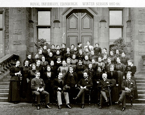 Figure 4 Women medical students, Royal Infirmary, Edinburgh, 1897–8. Women students were finally admitted to Edinburgh University in 1892, but they were taught separately from the men. This group photograph was taken in front of the main door, exactly where the male classes were photographed. Note the all-male teaching staff seated in the front row.