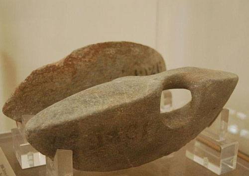 Figure 11 A pair of stone halteres from approximately 5th century BCE.
