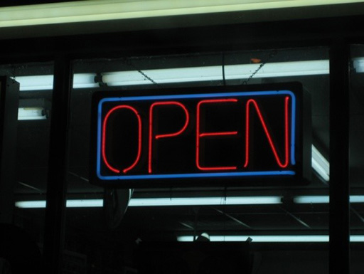 An image of an illuminated ‘open’ sign.