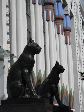 Detail of the building, showing papyrus-topped columns, and monumental cats flanking the entrance