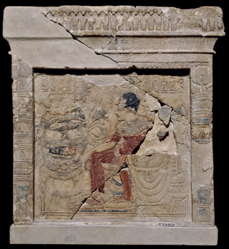 Stela showing Amenhotep III from Akhenaten’s capital, Tell el-Amarna in the new style