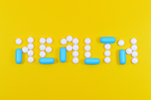 This is the word ‘Health’ spelt out with tablets.