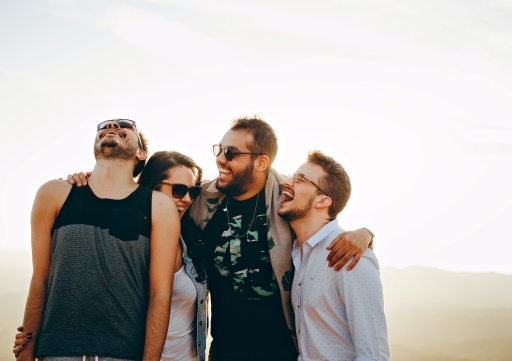 This is a photograph of a group of smiling people.