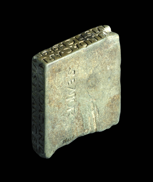 Oculist’s stamp from first to fourth century, with letters incised around the edges and on its surface.