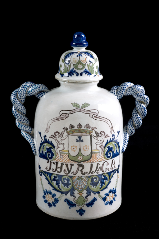 Ornate medicine jar with the word ‘Thyriaca’ written across the front.