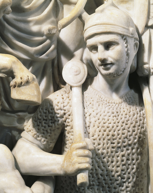 Detail of a Roman soldier from a marble relief sarcophagus that depicts a battle.