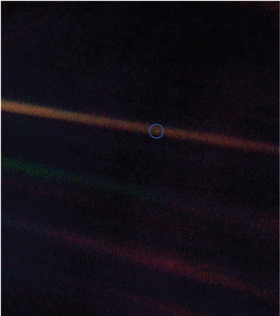 An image of the Earth taken from the Voyager spacecraft as it was leaving the Solar System.
