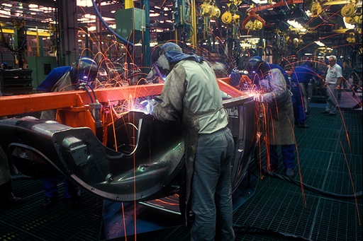 This is an image of people at work in a factory.