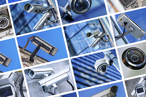 The image is of various security cameras used in cities.