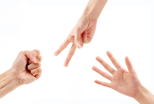 Image of three hands showing different gestures.