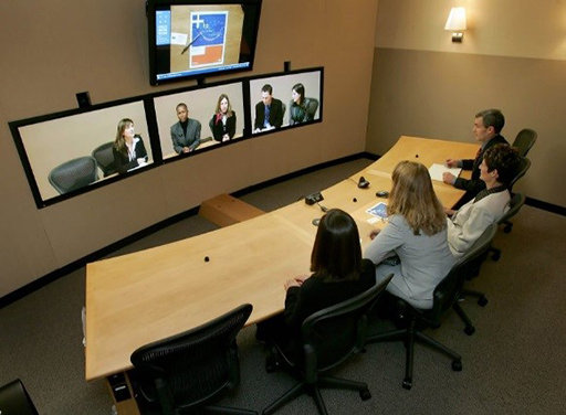 An image of a virtual team having a meeting that spans four locations.