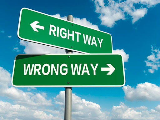 There are two signs. One says right way. The other says wrong way.
