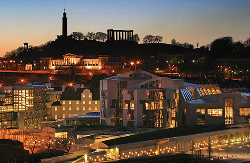 The Scottish Parliament illuminated at night