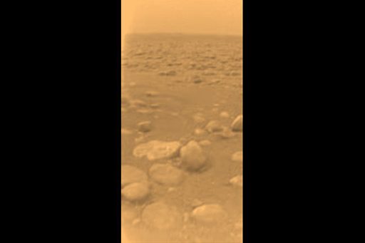 The surface of Titan as seen from ground-level by the Huygens lander.
