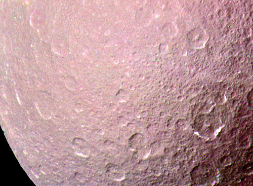 A classic colour view showing Rhea’s heavily cratered surface, from Voyager 1 in 1980.