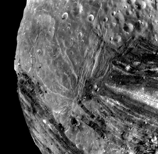 Voyager 2 image of Miranda. The remarkable variety of terrain is clearly visible.